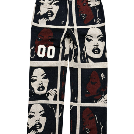 Black and white tapestry pants with comic book-style female faces.