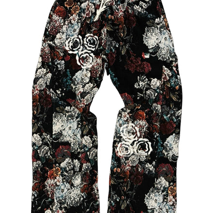 Black floral print sweatpants with a white drawstring.