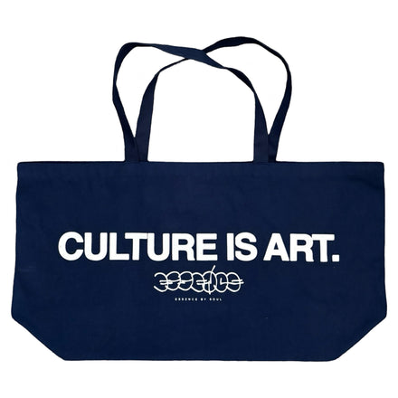 Navy blue tote bag with white text reading ’CULTURE IS ART.’ and a stylized logo underneath.