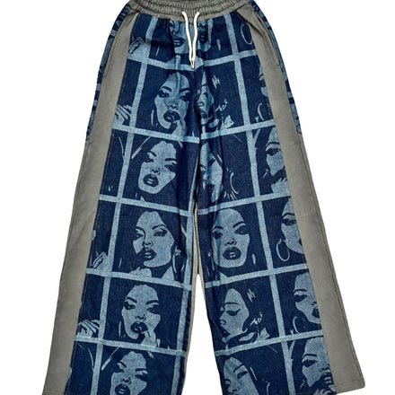 Wide-leg track pants with a grid pattern of stylized female faces.