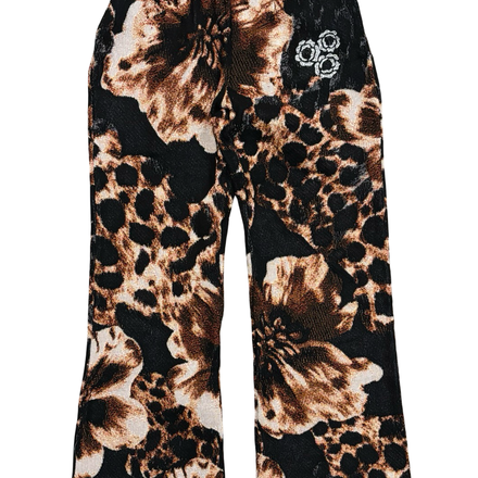 Black and brown floral and leopard print women’s pants with an elastic waist.